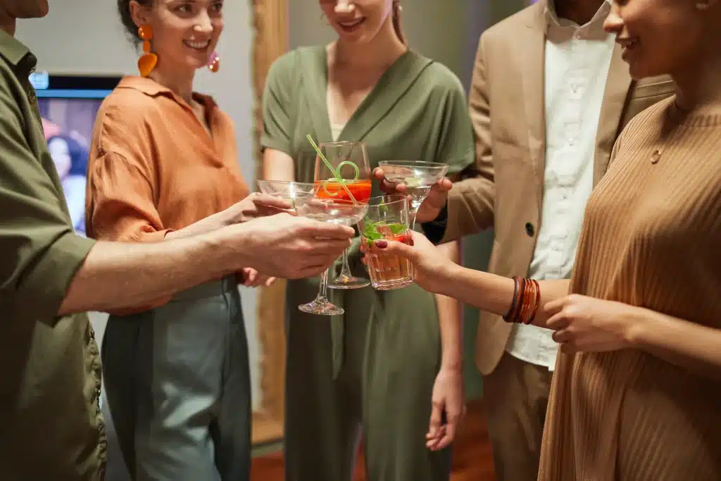 Guests enjoying signature cocktails at a professionally hosted cocktail party in Australia